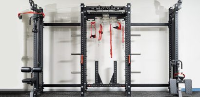 squat rack and bench with weights