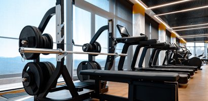 Modern gym interior with new fitness equipment